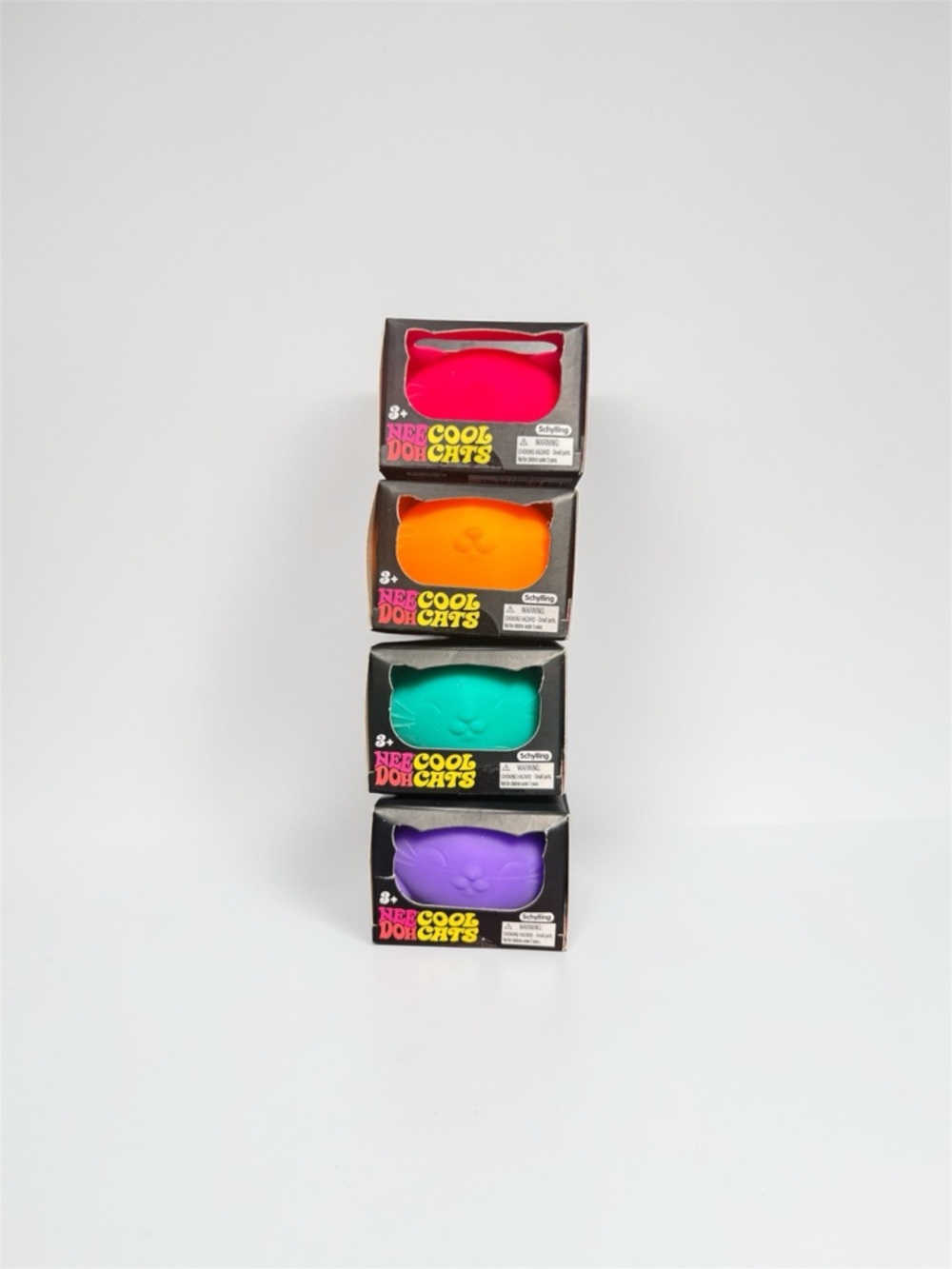 NEEDOH Set of 4 Neon Cool Cats Silicone Toys - Pink, Orange, Teal, Purple